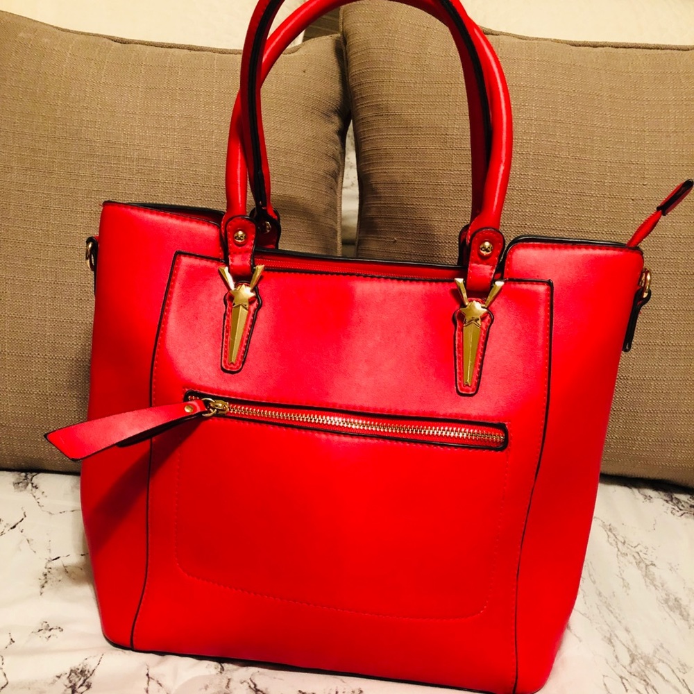 Bright red shoulder bag.